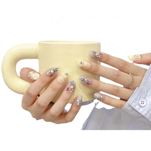Handmade press-on nails with retro floral patterns and Chinese character design