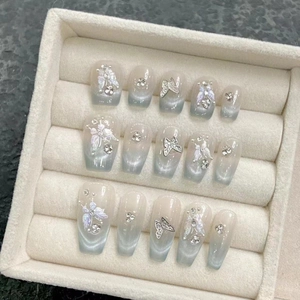 Unghie finte artigianali 15pz effetto cat eye blu-grigio con farfalla 3D e strass luce