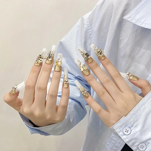 Luxury handmade gold glitter press-on nails with 3D rhinestones and pearls in long coffin shape