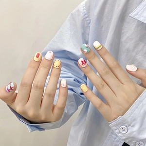Uñas postizas artesanales en colores macaron con lazos 3D y diseños lindos