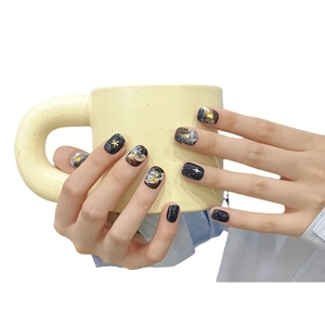 Starry sky press-on nails with blue marble texture, gold foil, and glitter square round shape