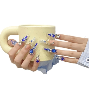 Handmade long trapezoid press-on nails with blue rhinestones and gold butterfly charms