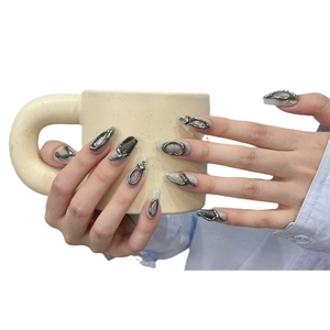Handmade press-on nails in light gray with 3D silver relief and long coffin shape