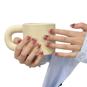 Handmade press-on nails with burgundy rose gradient design and 3D floral accents