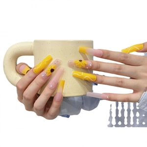 Handmade long coffin press-on nails with yellow sunflowers and rhinestone accents
