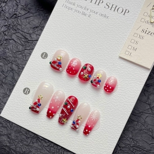 Handmade Christmas red gradient press-on nails with 3D trees and snowflake designs