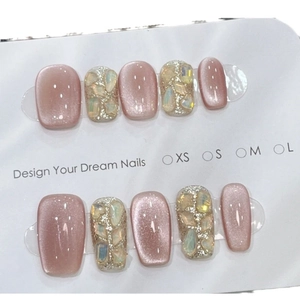 Cat-eye porcelain white and pink press-on nails with sparkling rhinestones set