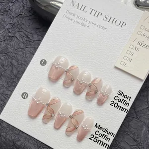 Handmade ballet cat eye press-on nails with pearls, rhinestones and gold bow accents
