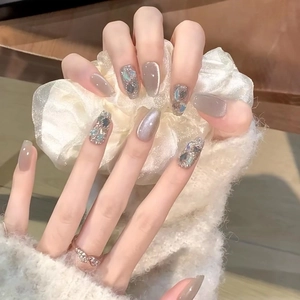 Cat eye press-on nails with silver glitter and iridescent sequins in square oval shape