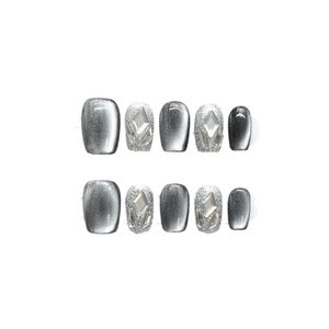 Silver grey cat-eye press-on nails with glitter rhinestones in a short square shape