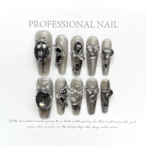 Ongles faits main œil de chat gris avec nœuds argentés et strass noirs brillants