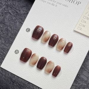 Short amber marble press-on nails with caramel gradient design for a minimalist autumn look