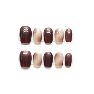 Caramel amber short press-on nails with autumn marble texture and glossy finish