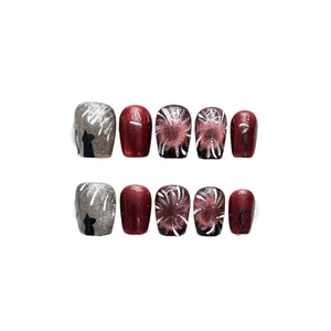Handmade press-on nails in burgundy cat-eye and silver glitter with black cat design