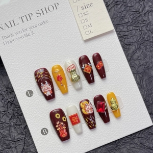 Handmade Chinese New Year press-on nails with 3D dragon and lucky charm charms