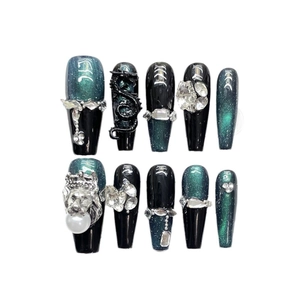 Dark Gothic press-on nails featuring green cat-eye effect and 3D silver dragon charms