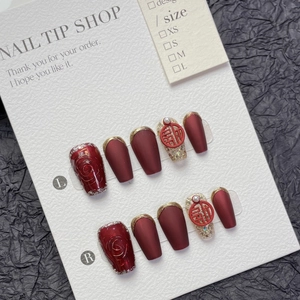 Handmade red and gold Chinese style press-on nails with 3D roses and festive charms