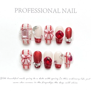 Handmade red and white press-on nails set with 3D bows, pearls and crystal rhinestones