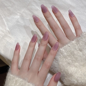 Velvet mauve cat-eye press-on nails in long oval shape with matte purple finish