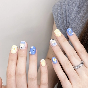 Cute macaron color press-on nails with 3D white flowers and polka dot patterns