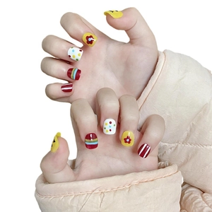 Colorful floral and rainbow pattern short round press-on nails for kids on white background