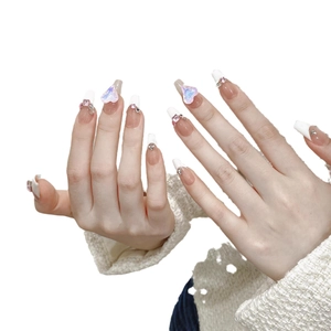 Handmade French white tip press-on nails with 3D heart rhinestones and pearls