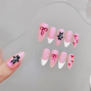 Handmade almond press-on nails featuring pink pearl finish and hand-painted punk cat art