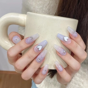 Handmade light purple gradient coffin nails with silver lines, rhinestones and heart decor