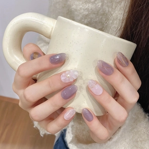 Elegant purple and pink gradient press-on nails with 3D floral accents and gold lines