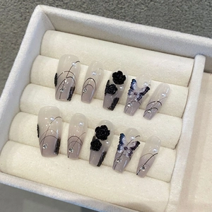 Dark aesthetic nail set with black 3D roses, pearls and rhinestones in coffin shape
