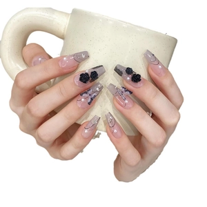 Handmade coffin nails with black roses, butterfly charms and pearls on purple gradient