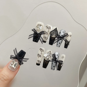 Handmade black French coffin press-on nails with 3D bows and rhinestones