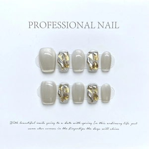 Silver cat eye press-on nails with champagne rhinestones in short square-oval shape