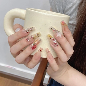Handmade press-on nails with red cherry beads, rhinestones and golden leaf hand-painted art