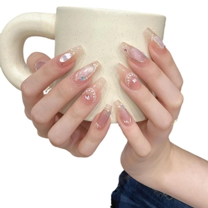 Handmade cat-eye press-on nails with pink gradient, pearls and glitter shells
