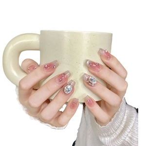Pink gradient long trapezoid press-on nails with shiny rhinestones and silver crystal gems
