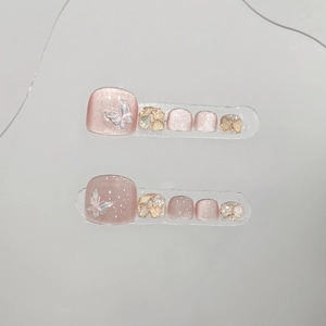 Handmade cat eye press-on toenails in pink with 3D butterfly and glitter accents