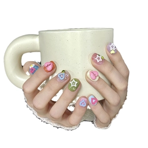 Handmade press-on nails with 3D colorful charms in sweet macalon dopamine aesthetic
