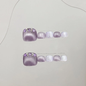 Handmade purple cat eye press-on toenails with heart crystals and silver glitter