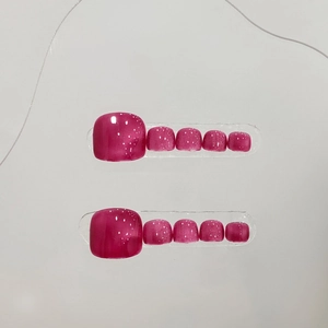 Handmade cat eye press-on toenails in deep pink with glittering metallic shimmer finish
