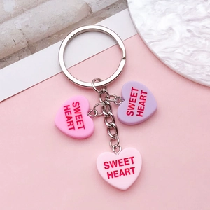 Three-piece Sweet Heart charm keychains in pink and purple resin for DIY jewelry making