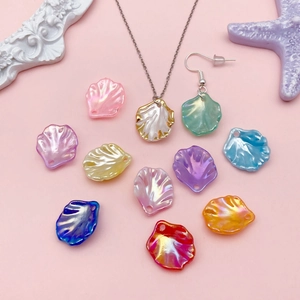 DIY shell-shaped acrylic pendants in assorted pearlescent colors for jewelry making
