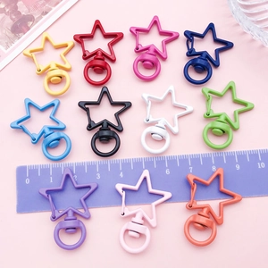 Star-shaped zinc alloy lobster clasps in various vibrant colors with size reference