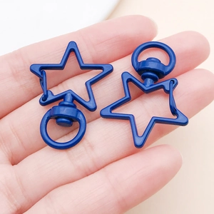 Close-up of blue star-shaped zinc alloy lobster clasp with 360-degree swivel ring