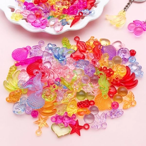 Colorful mixed acrylic pendants including heart, cherry, and bear shapes for DIY jewelry