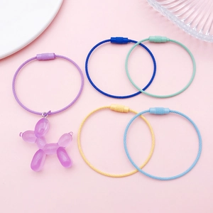 Set of colorful stainless steel wire keychains with a cute purple resin balloon dog charm