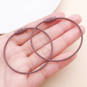 Close-up of brown coated stainless steel wire keychains with secure screw lock connectors