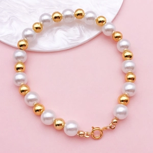 Elegant pearl and gold bead bracelet with 6mm/7mm copper spring clasp closure