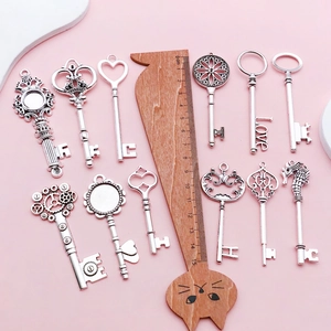 Set of 11 vintage silver alloy heart and crown key pendants for DIY jewelry making