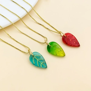 Handmade leaf pendants in blue, green, and red with golden veins and matching chains